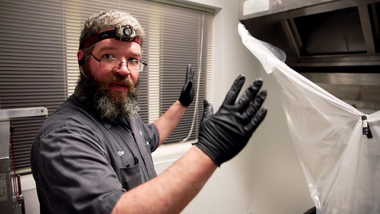 D&E Hood Cleaning professional team performing commercial kitchen exhaust cleaning